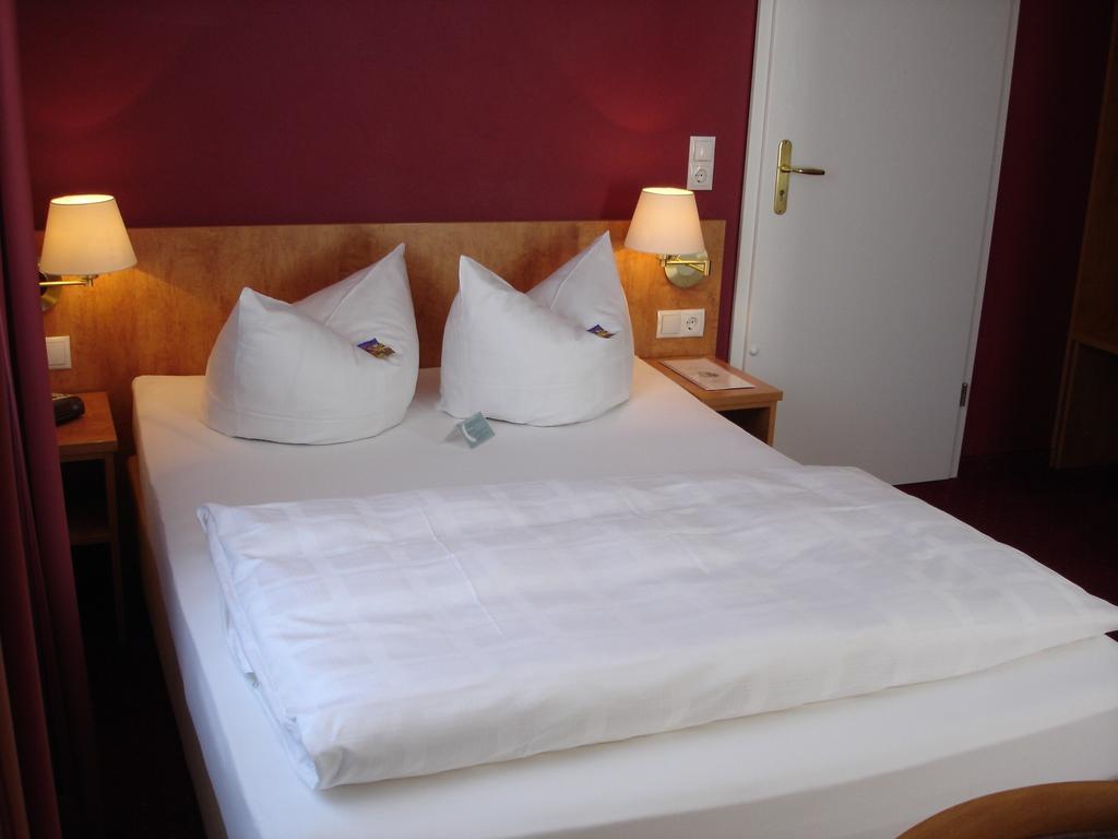 Myrooms Neu-Isenburg Rom bilde